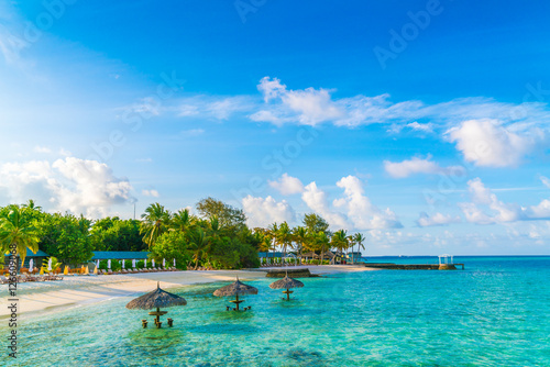 Beautiful tropical Maldives island with white sandy beach and se