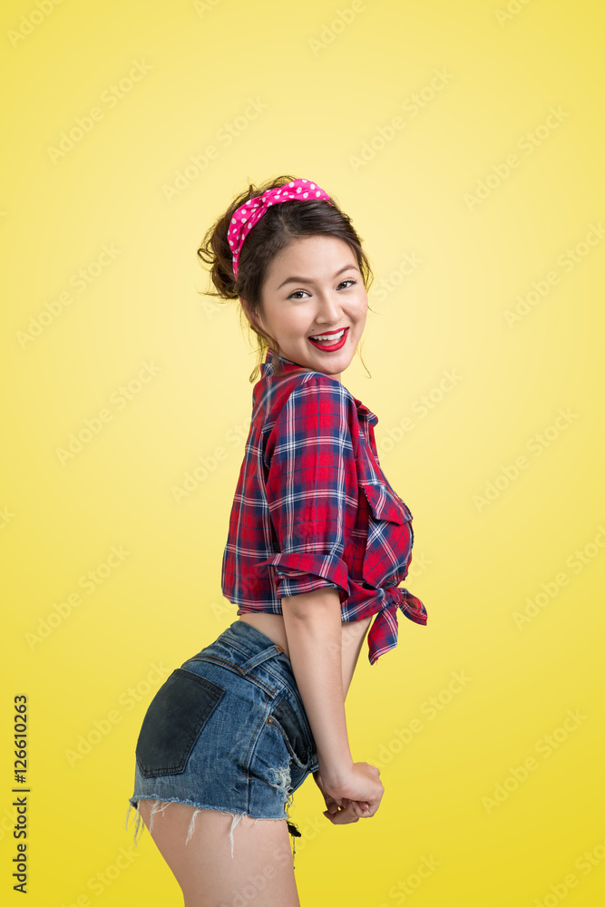 Lovely woman retro portrait with pin-up make-up and hairstyle p Lovely woman retro portrait with pin-up make-up and hairstyle p