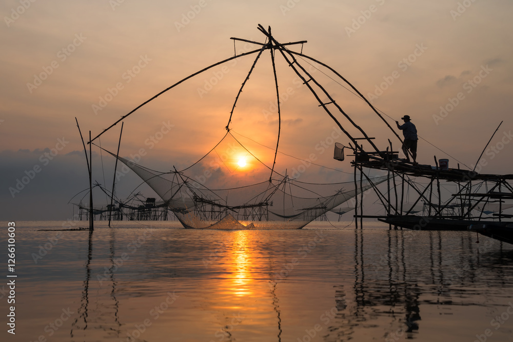 Fisherman with giant square dip net at Pakpra canal, Phatthalung, Thailand