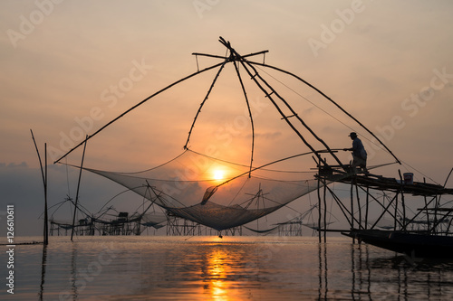 Fisherman with giant square dip net at Pakpra canal  Phatthalung  Thailand