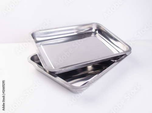 tray or metal baking tray on background.