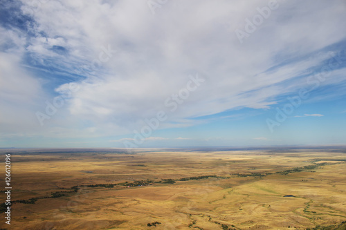 Flat expanse of the Great Plains seen from atop Bear Butte in South Dakota.