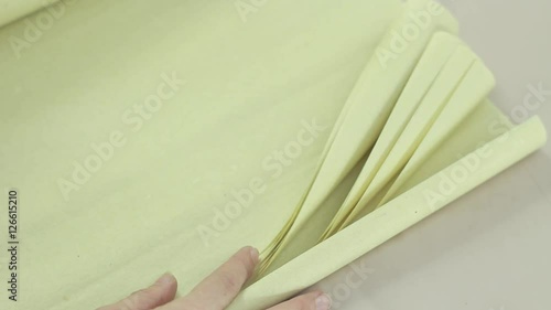Vintage Paper. Girl Takes One Sheet of Vintage Paper.