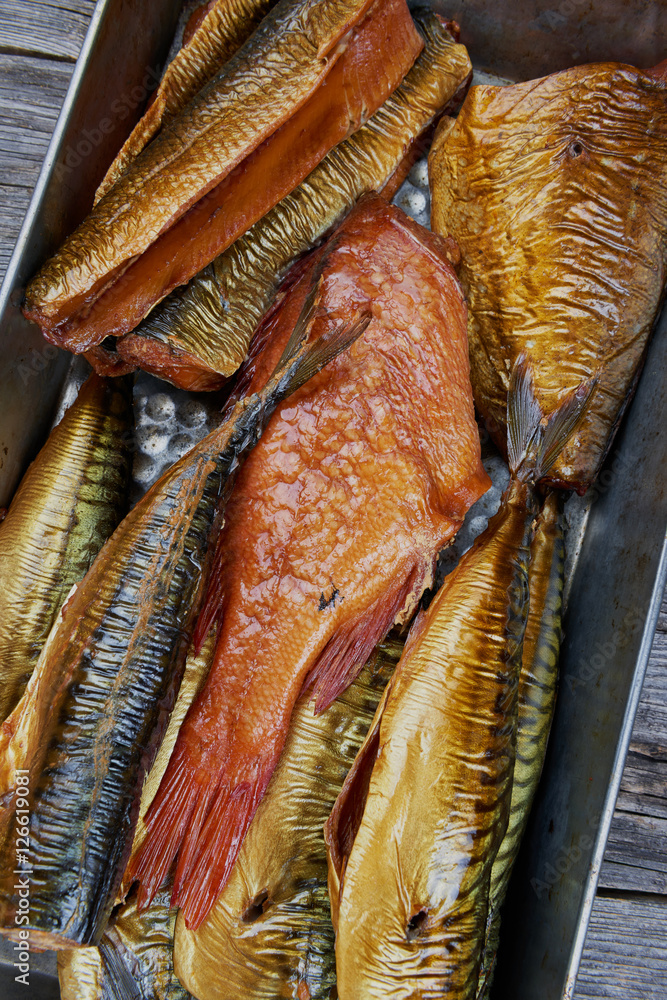 Set of smoked fish in a tin pan Set of smoked fish in a tin pan