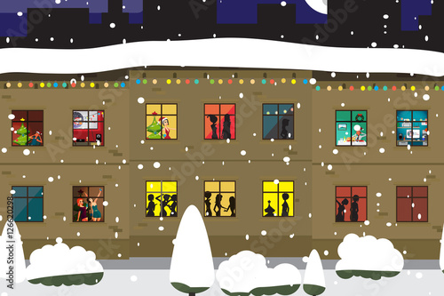 The windows of an apartment house in the evening of Christmas or