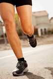 Fit woman running and exercising.