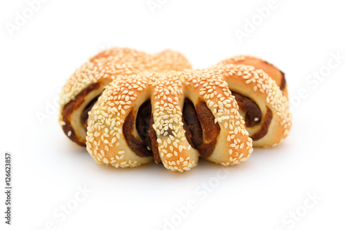 bread with BBQ beef on top on a white background
