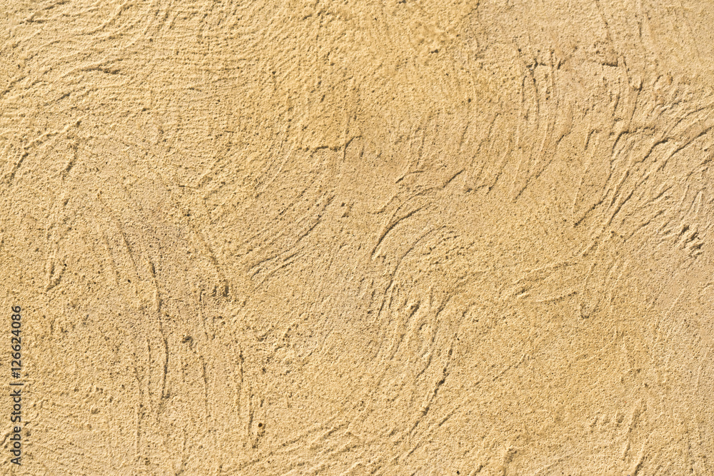 Beige relief stone wall, background, texture Beige relief stone wall, background, texture