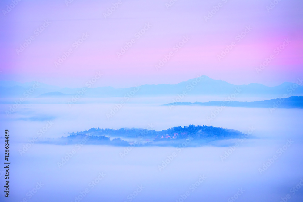 Amazing mountain landscape with fog in morning Amazing mountain landscape with fog in morning
