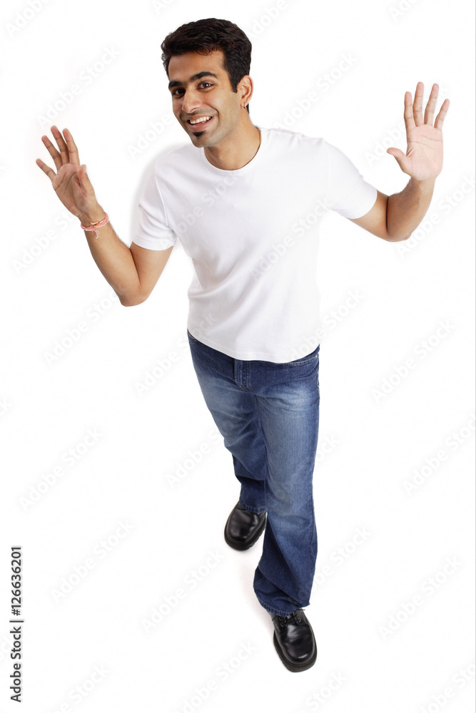 Man looking at camera, arms open, palms showing Man looking at camera, arms open, palms showing