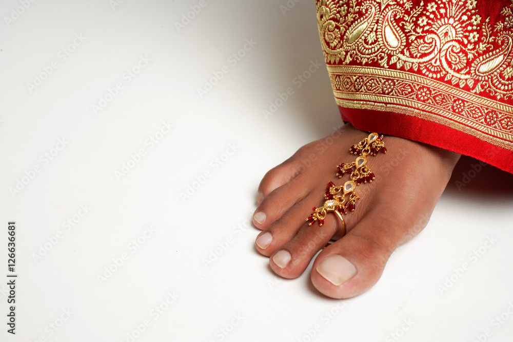 Close-up of woman's feet with traditional Indian toe ring