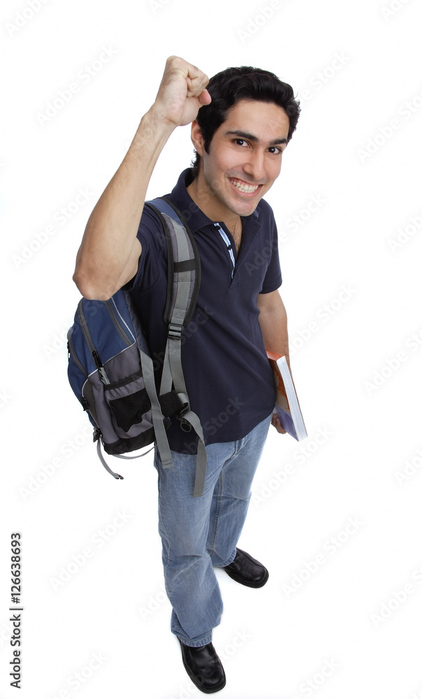 College student looking at camera, raising a fist, smiling College student looking at camera, raising a fist, smiling