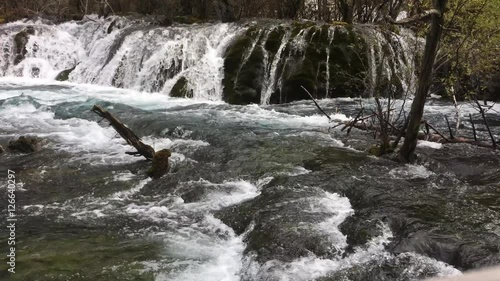 Pearl Shoal Waterfall at Jiuzhaigou National Park  where is the UNESCO World Heritage in Sichuan , China in  Autumn in November located in  in  Tibetan-Qiang of Sichuan ,China photo