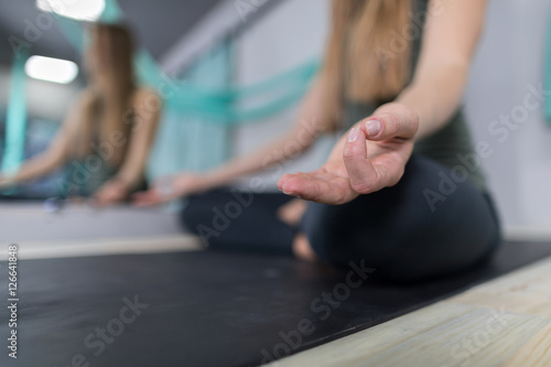 Woman Doing Yoga Exercises In Gym, Closeup Sport Fitness Girl Sitting Lotus Pose Meditation Relaxation