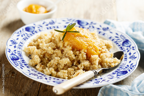 Austrian crumble dessert with fruit puree photo