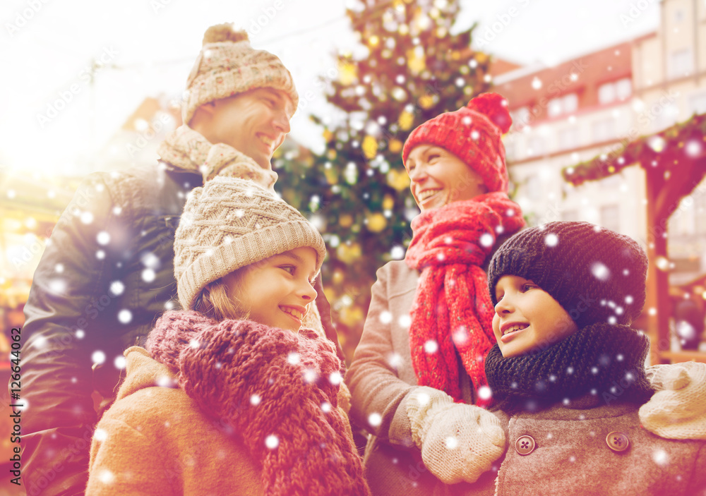 happy family over city christmas tree and snow happy family over city christmas tree and snow