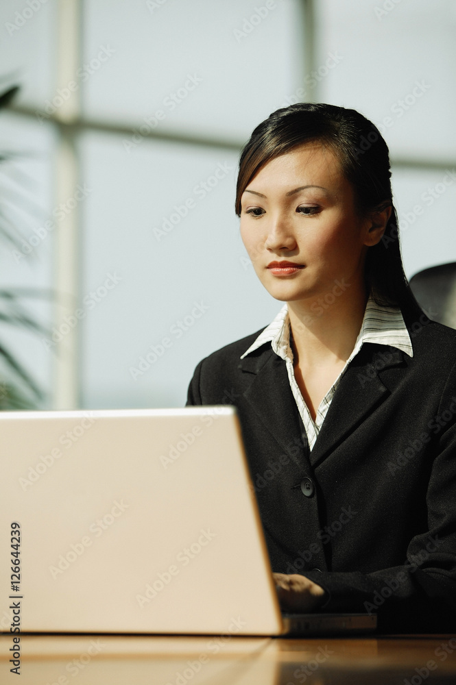 Young woman using laptop Young woman using laptop