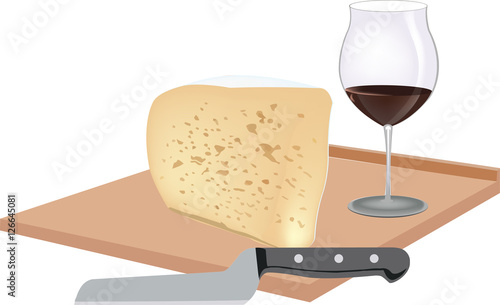 formaggio sul tagliere con bicchiere di vino