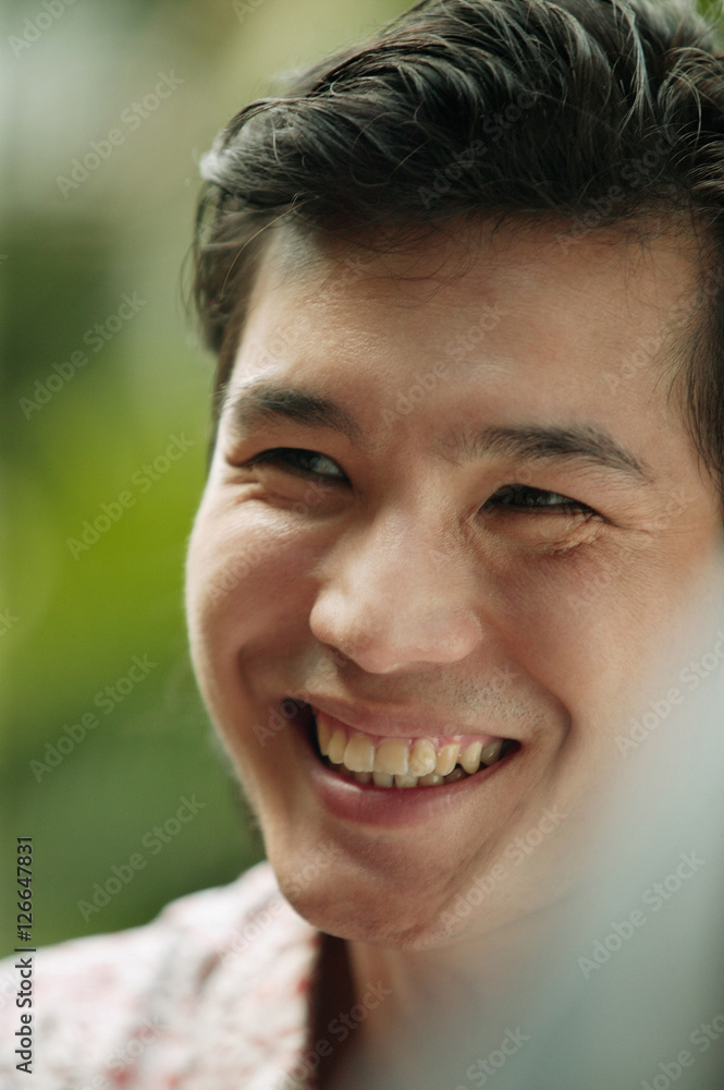 Young man smiling, portrait Young man smiling, portrait