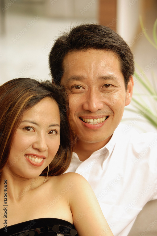 Couple looking at camera, portrait Couple looking at camera, portrait
