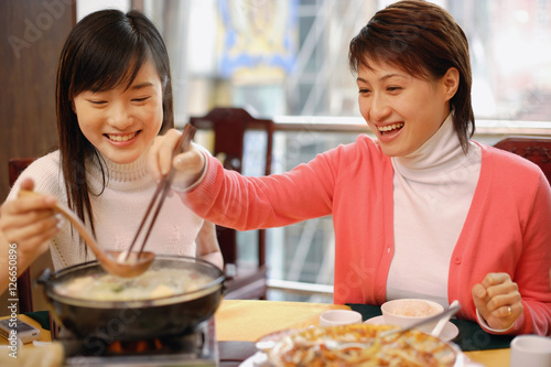 Young women eating at a restaurant