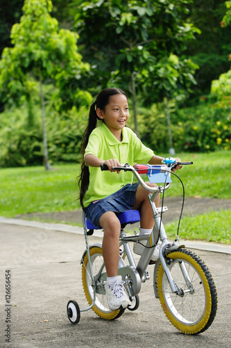 Young girl on bicycle