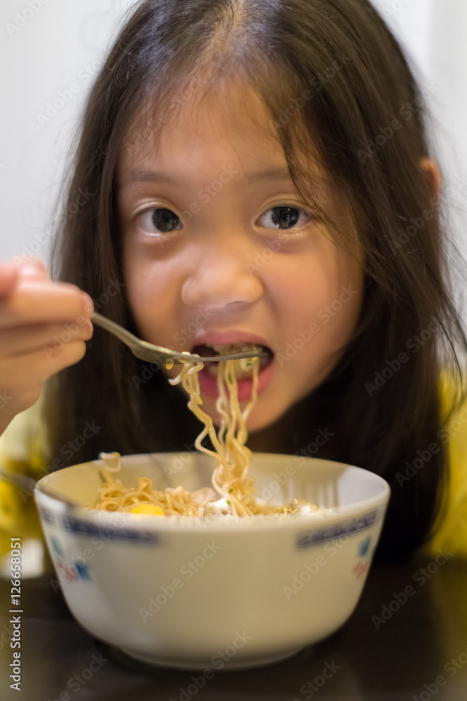 Child Eating Noodle