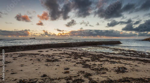 Dawn at Cullercoats Bay, North Tyneside, Engalnd, UK. From North Pier looking southward.