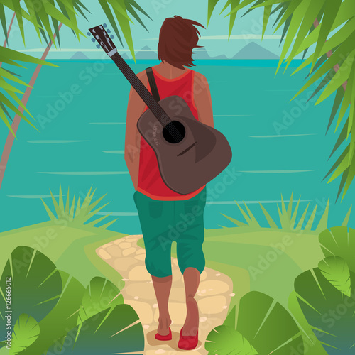 Young man with disheveled hair and guitar behind his back, walking along a footpath to the sea. Back view. Seclusion or romantic concept