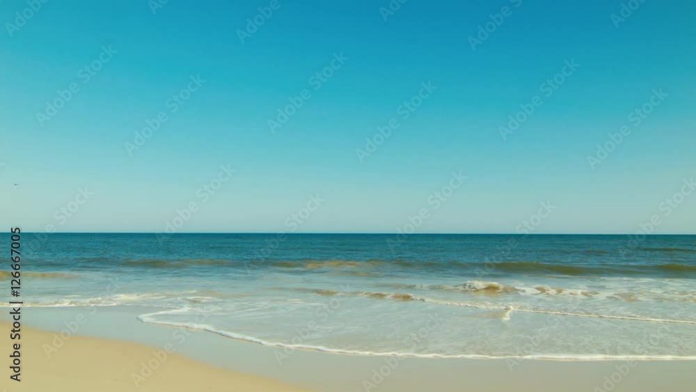 Waves Washing Ashore A Quiet Beach Waves Washing Ashore A Quiet Beach