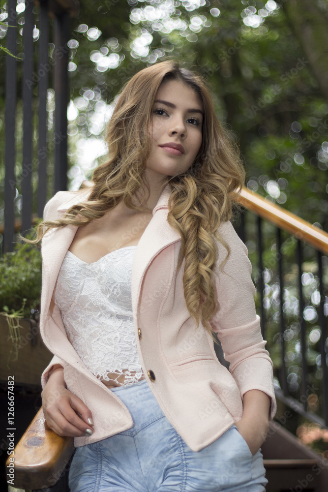 Obraz premium Woman posing on stairs