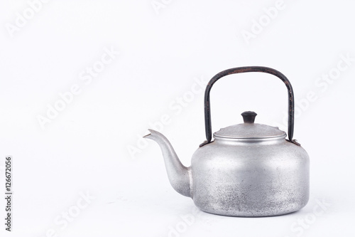 old vintage retro Kettle on white background drink isolated ( still life). Which, kettle made of aluminum materials.
