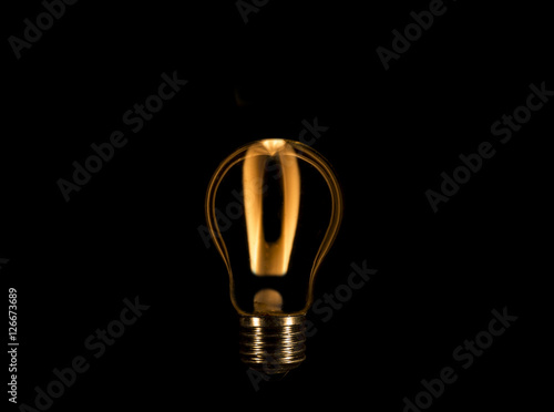 Exclamation point inside a bulb