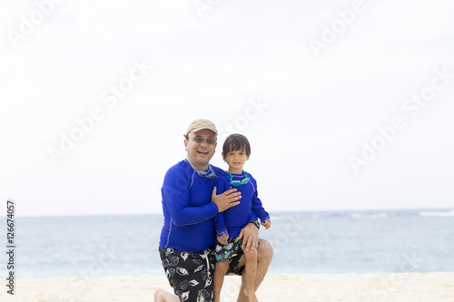 Lovely Father and Son Enjoying at the beach