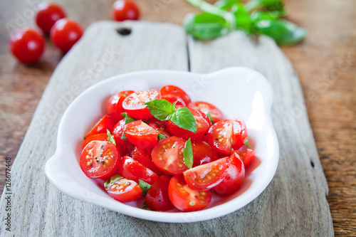 Cherry tomatoes basil salad.