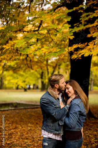 Loving couple in autumn park