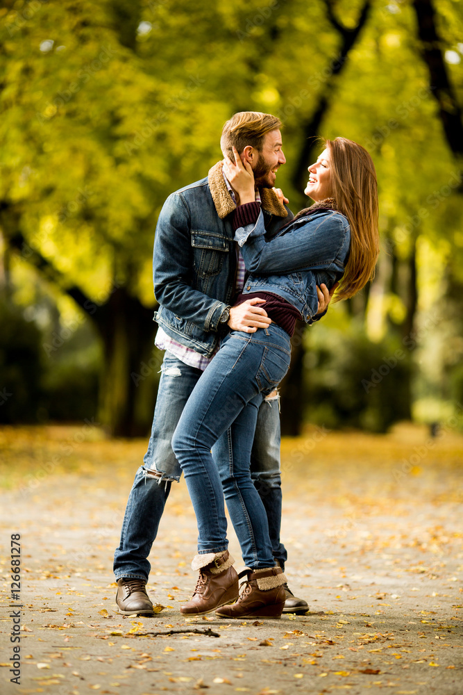 Couple in the autumn park Couple in the autumn park