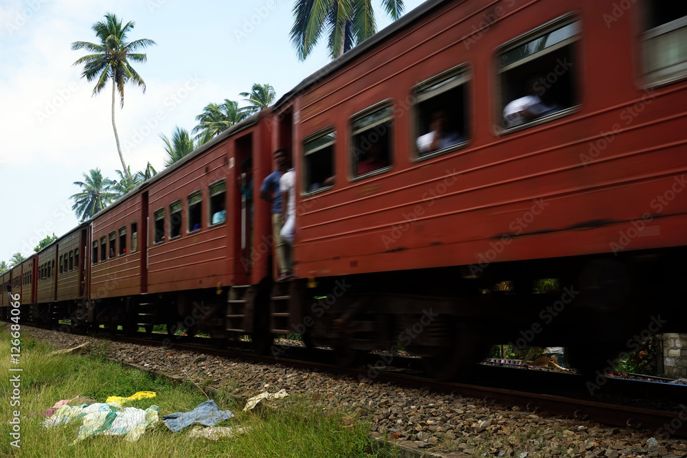 Moving train on the railway