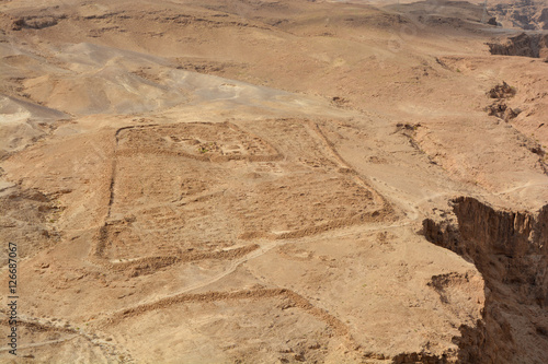 Remnants of Roman Camp one of several legionary camps just outside the circumvallation wall of Masada. The siege of Masada was 1 of the final events in the 1st Jewish Roman War  photo