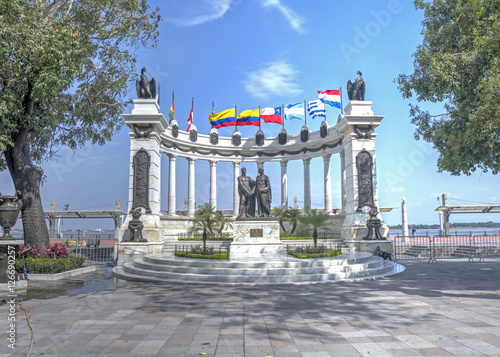 The Hemiciclo monument on the boardwalk of downtown Guayaquil on a sunny day photo