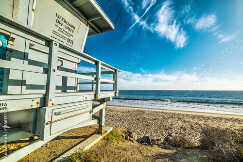 wooden lifeguard tower in Malibu at sunset
