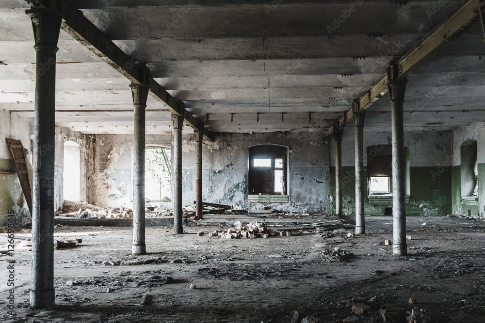 Industrial building interior of abandoned wharehouse in dark colors