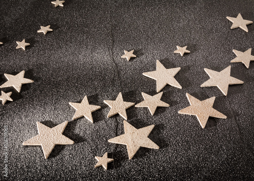 stars on snow. winter abstract background or texture