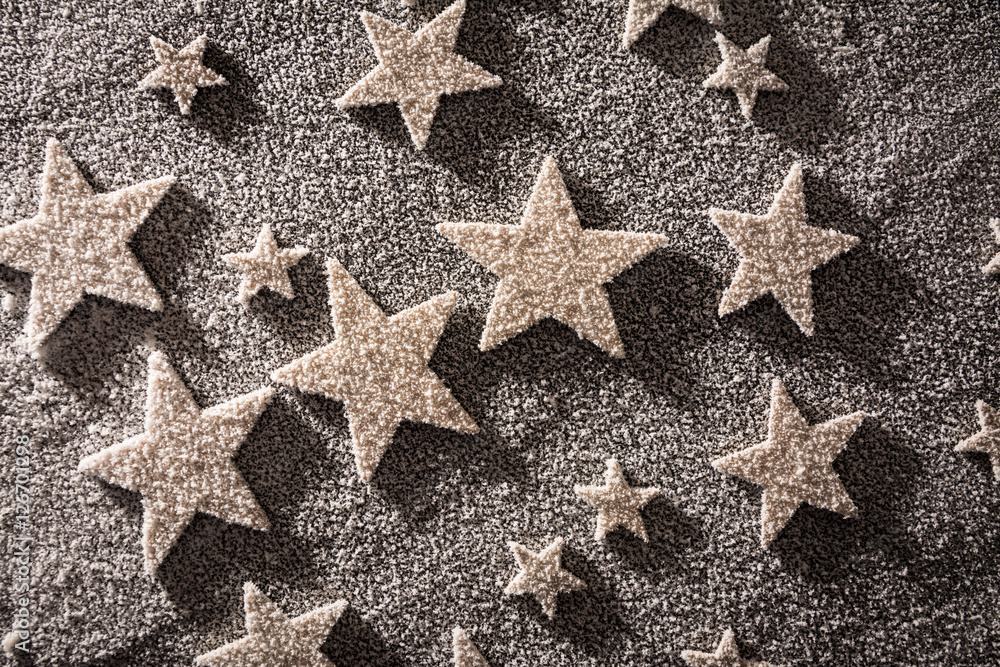 stars on snow. winter abstract background or texture