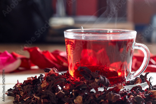 Red Hibiscus tea in glass mug