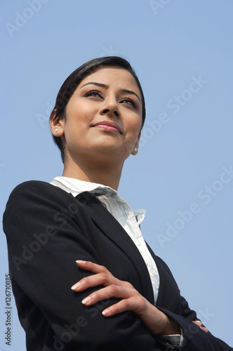 Obraz na płótnie business woman with arms crossed w salonie