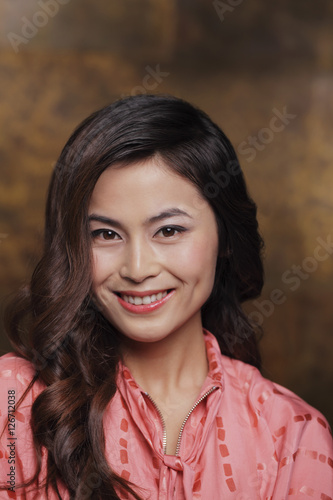 Head shot of young woman smiling