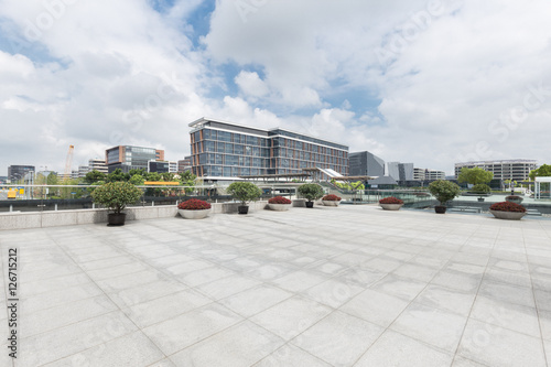 modern buildings in shanghai from empty brick floor