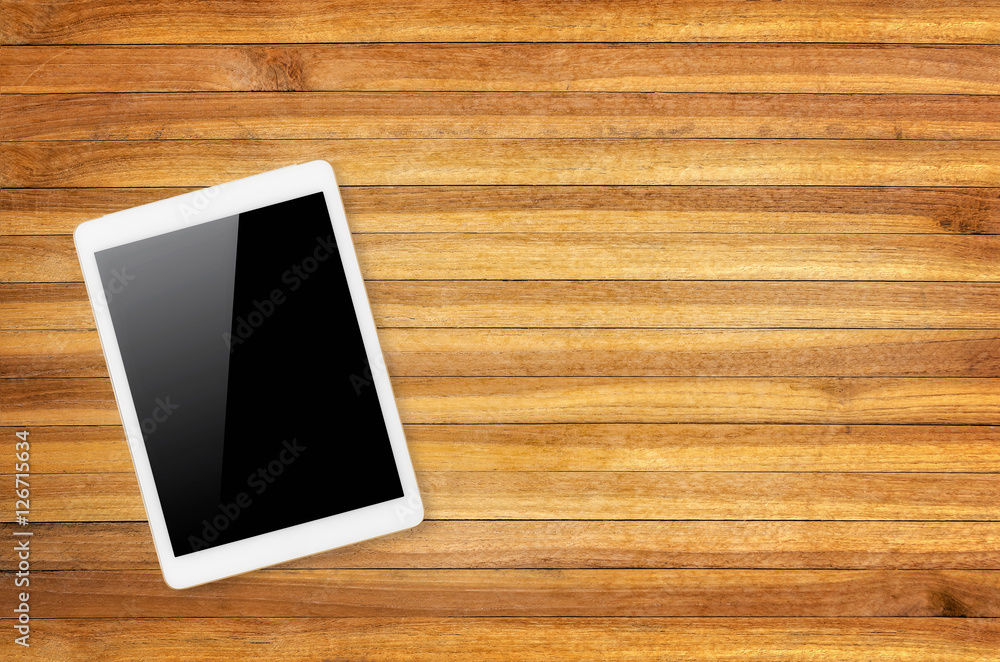 Digital tablet on wooden background. Digital tablet on wooden background.