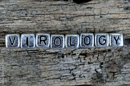 Fotografi cube word virology on table